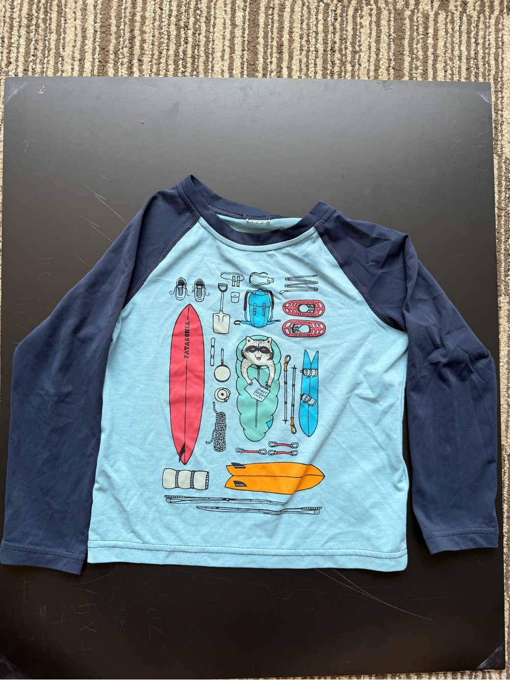 Patagonia Kids Two-Tone Navy and Light Blue Rashguard with Surf Graphic